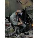 man using electric welder n°1