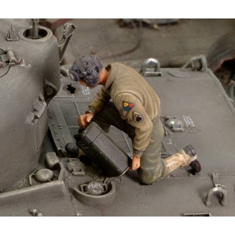 U.S. crew member refuelling tank 