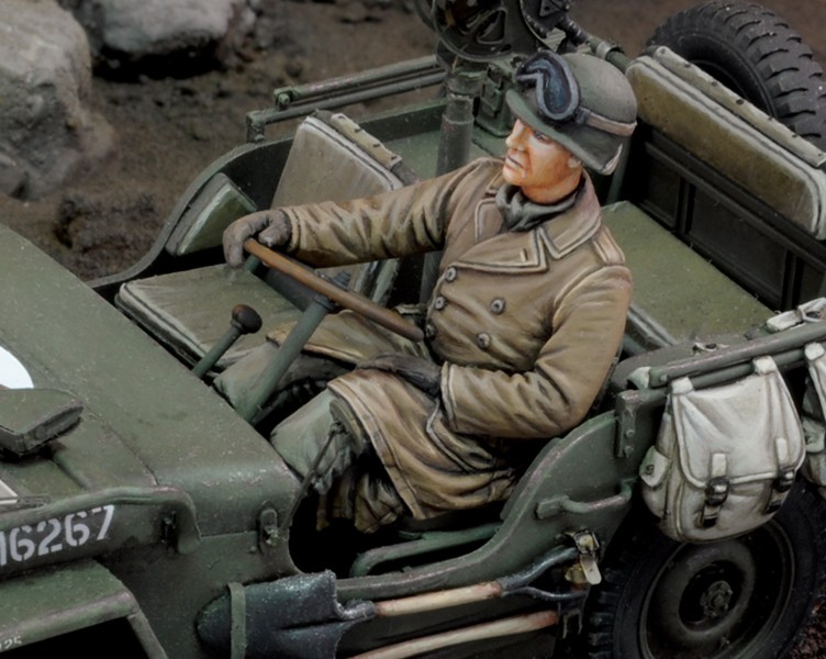 U.S jeep driver U.S infantry at rest with rifle WWII
