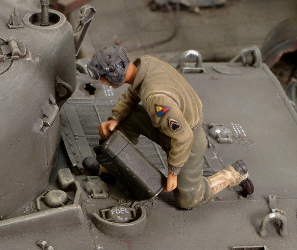 U.S. crew member refuelling tank