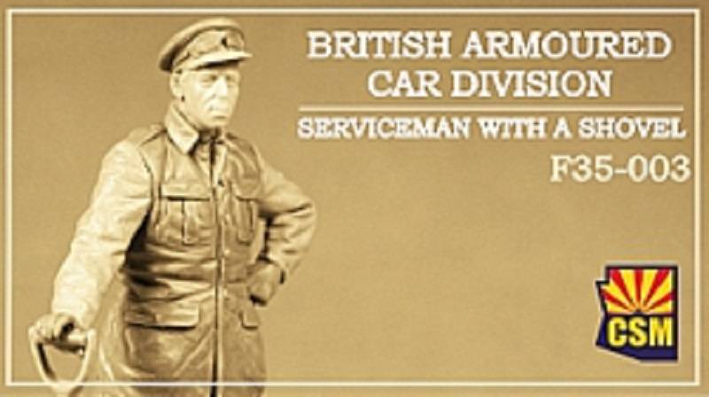 British Armoured Car Division Serviceman with a shovel