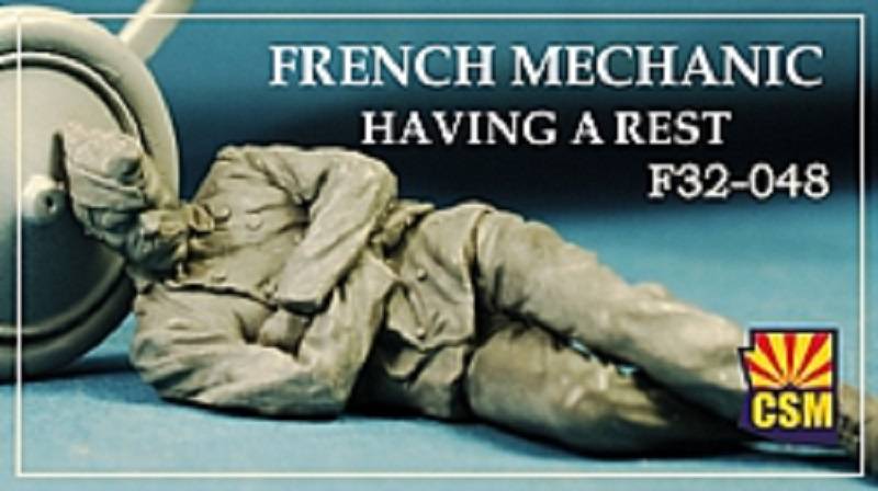 French mechanic naving a rest