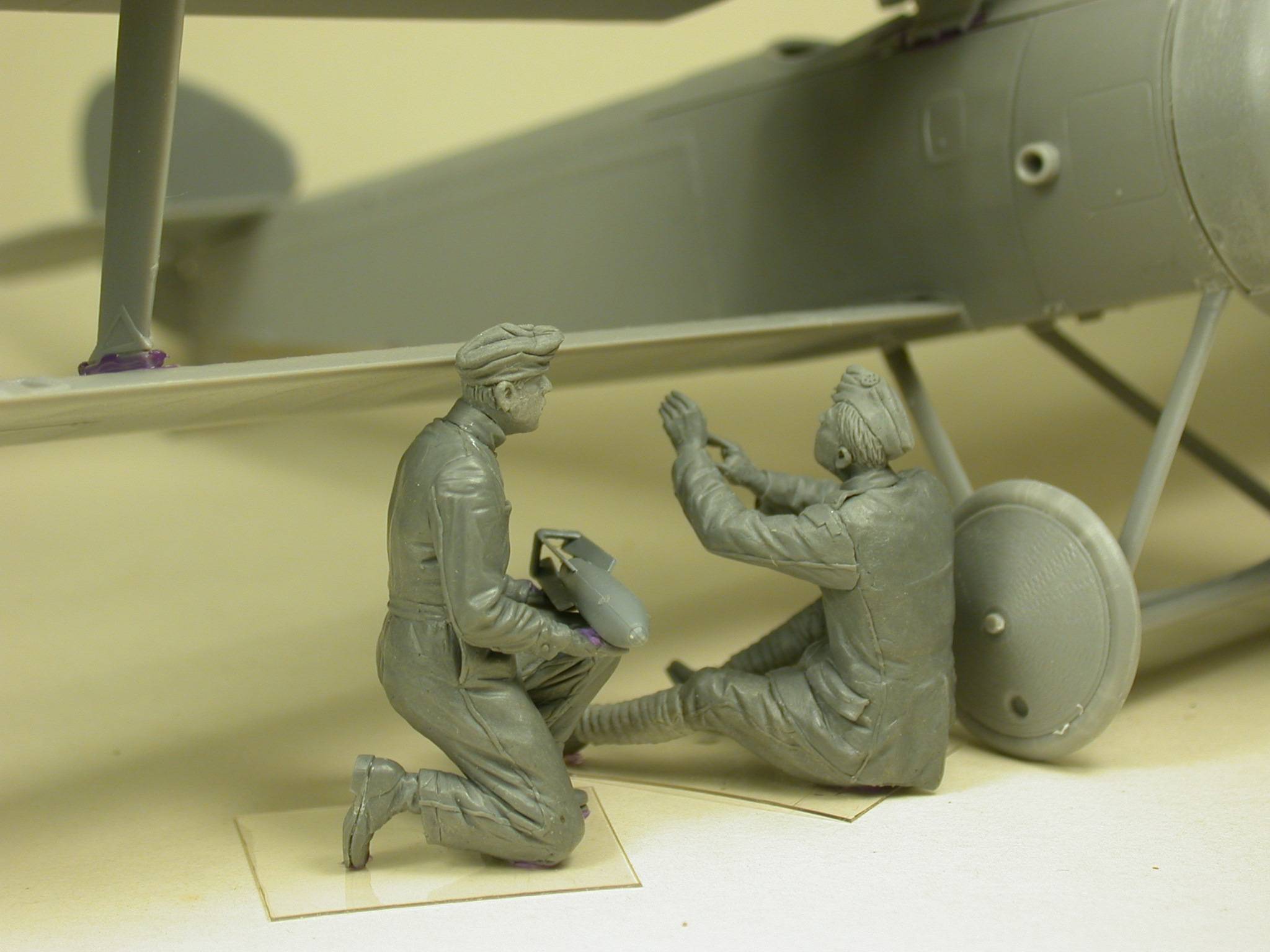 RFC Air Mechanics installing the bombs – Image 2